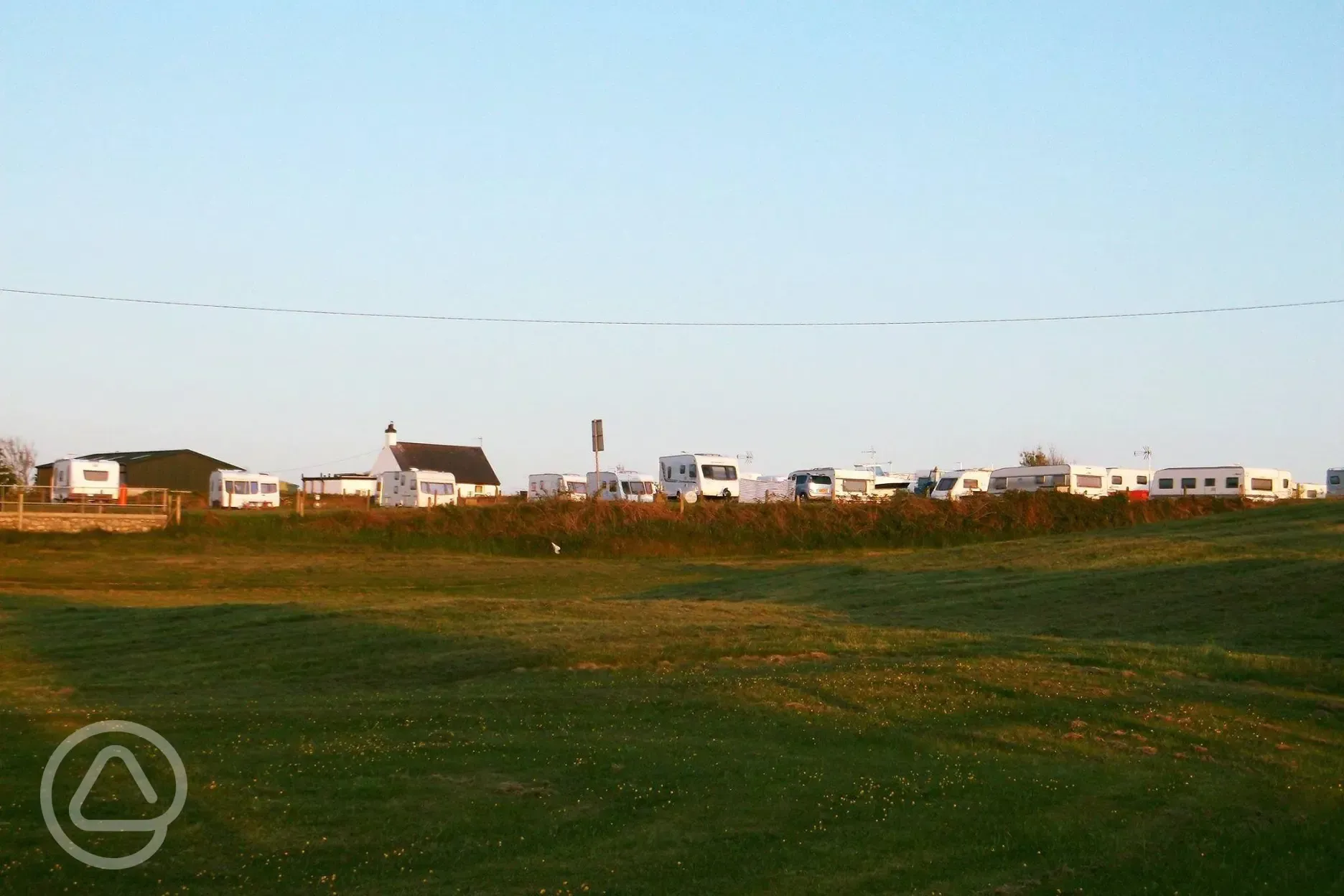 Riverside paddock and the touring park