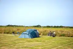 Large tent on a non electric grass pitch (12m x 14m) Large tent on a non electric grass pitch (12m x 14m)