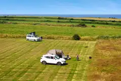 Non electric grass pitch with space for a parked car Non electric grass pitch with space for a parked car