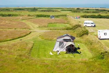 Secluded electric grass pitches (14m x 12m) at Shortlands Farm