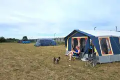 Large tents on 16 amp electric grass tent pitches (5m x 15m)