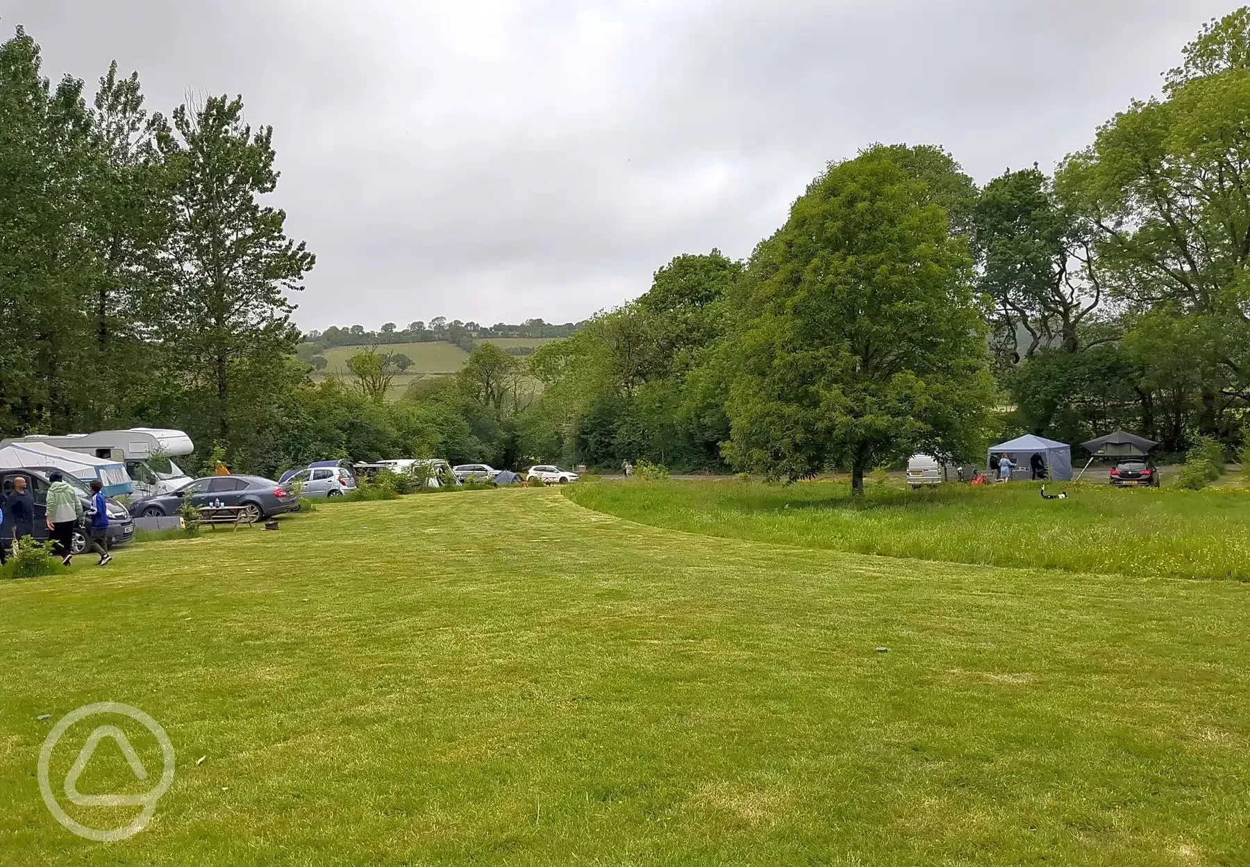 Grass pitches with optional 10 amp hook up for tents and tourers