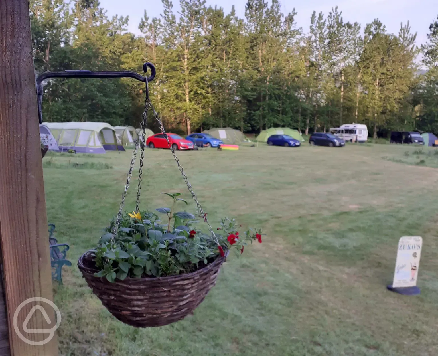 Grass pitches with optional 10 amp hook up for tents and tourers