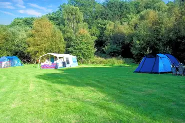 Tents on grass pitches with optional 10 amp hook up