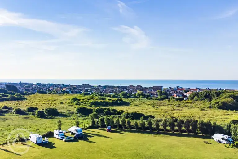 Aerial of campsite with sea views