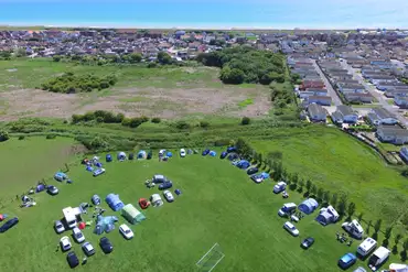 Aerial of The Barn Caravan Park with views to Lancing Beach