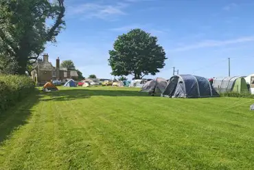 Non electric grass tent pitches