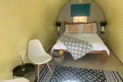 Camping pod with a double bed and bedding Camping pod with a double bed and bedding