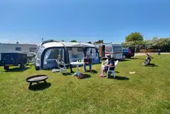 Electric grass touring pitches with 16 amp hook ups Electric grass touring pitches with 16 amp hook ups