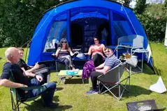 Electric grass pitches for tents and trailer tents