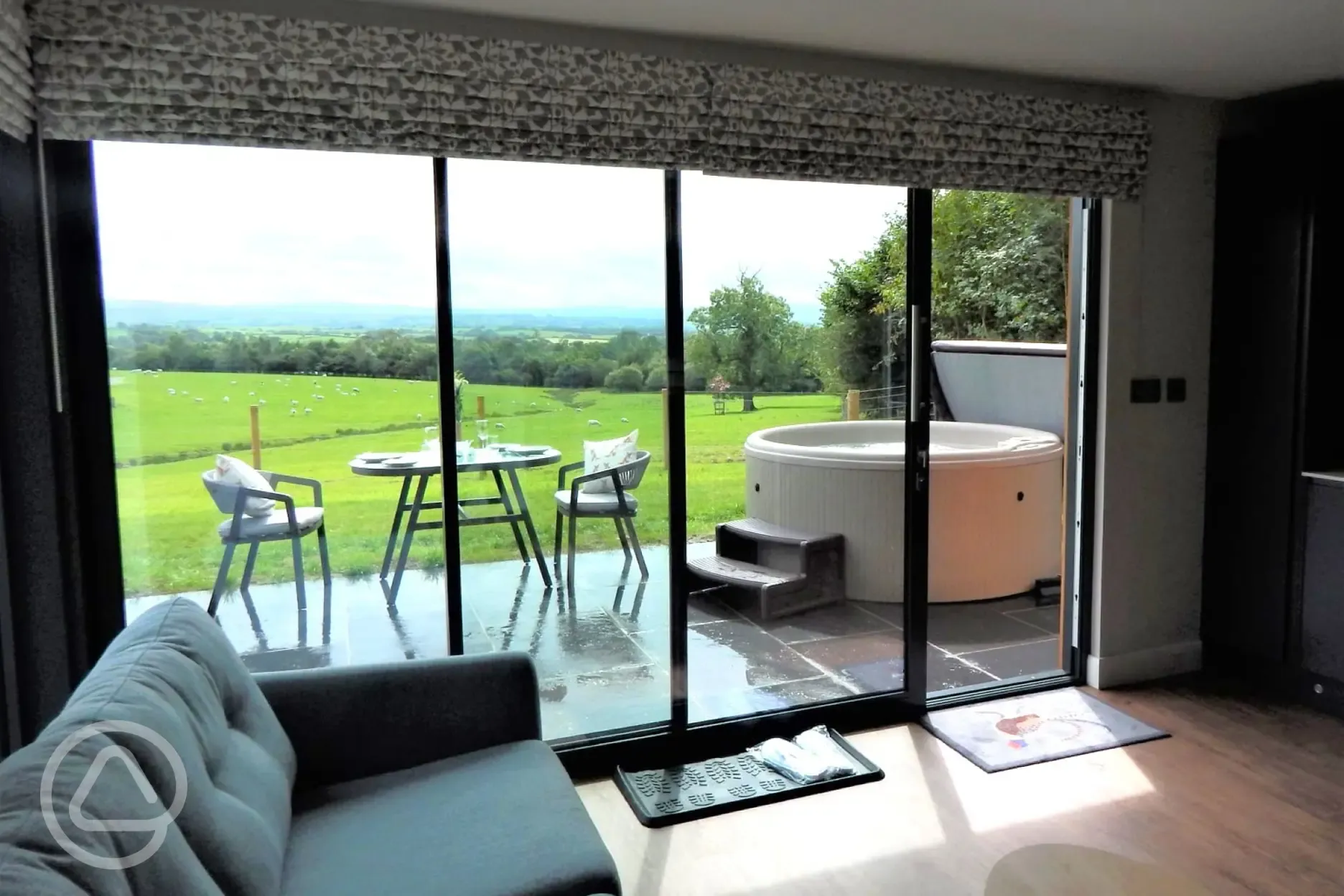 Ensuite glamping lodge living area with country views Ensuite glamping lodge living area with country views