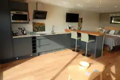 Graze Garth ensuite glamping lodge kitchen and dining space Graze Garth ensuite glamping lodge kitchen and dining space