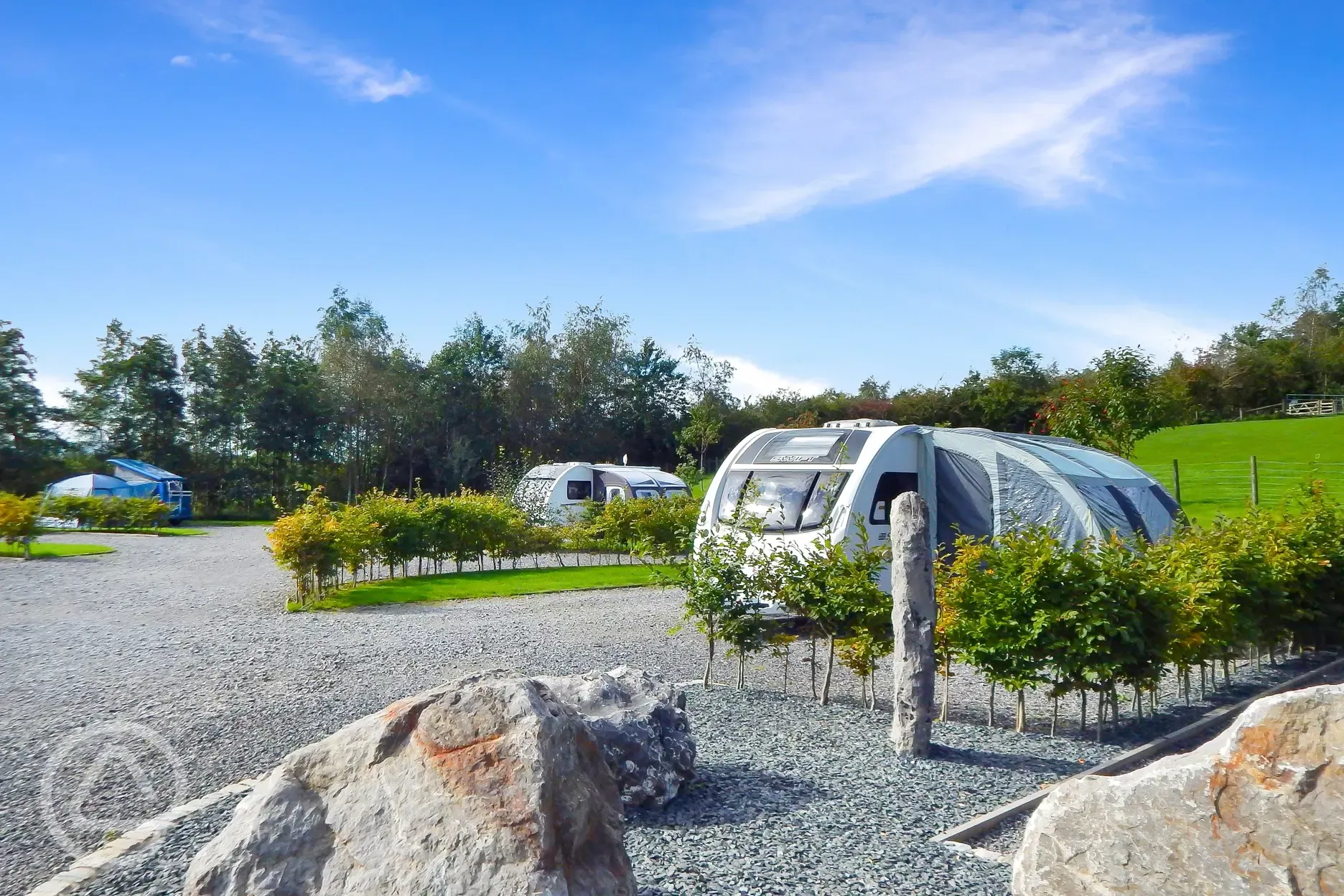 Caravans on electric hardstanding pitches with awning space Caravans on electric hardstanding pitches with awning space