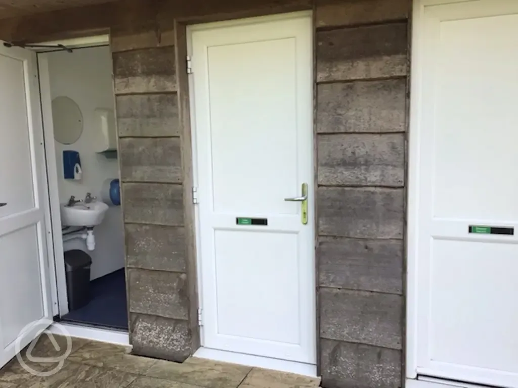 Three individual bathrooms with a shower, toilet and underfloor heating