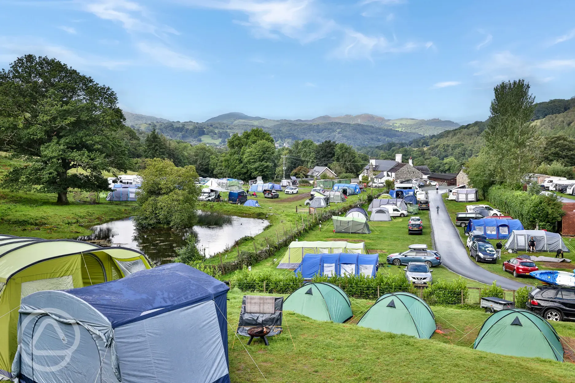 Site overview with grass and hardstanding pitches