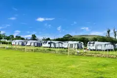 Electric grass touring pitches with awning space Electric grass touring pitches with awning space