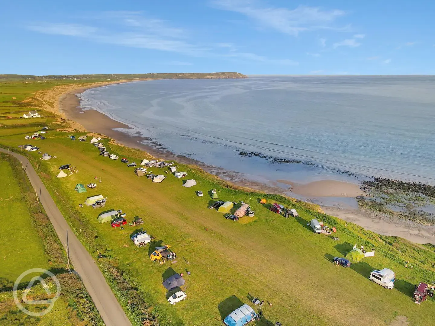 Aerial of campsite by the beach