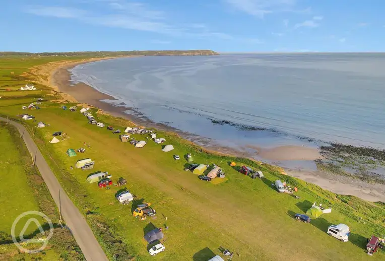 Aerial of campsite by the beach