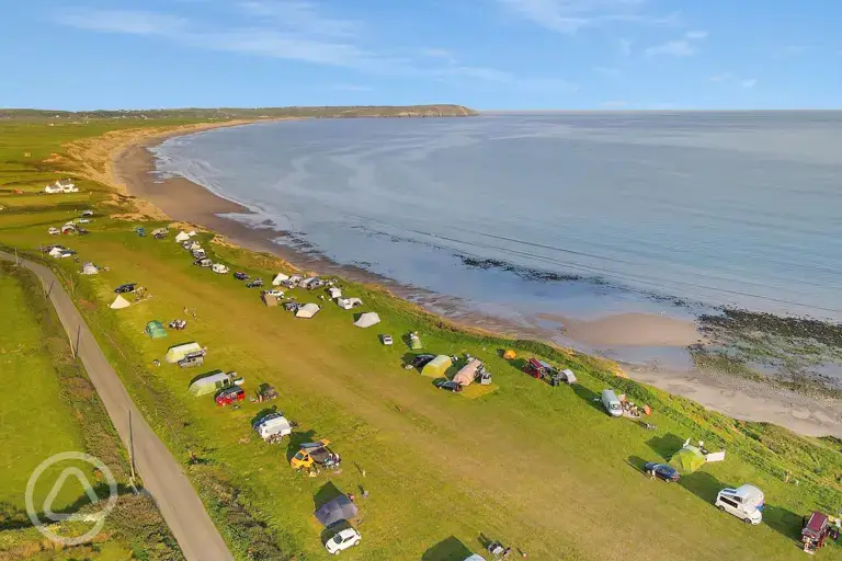 Aerial of campsite by the beach