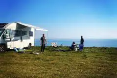 Non electric grass pitches with views of Hell's Mouth Bay Non electric grass pitches with views of Hell's Mouth Bay