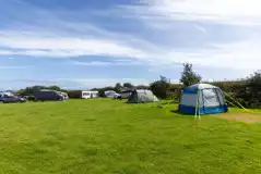 Premium electric and water pitches with a 16 amp hook up in Bowie Field