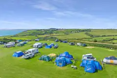 Aerial of Treveague Campsite overlooking the Cornish coast