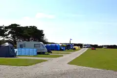 Electric hardstanding pitches set along the top hedge