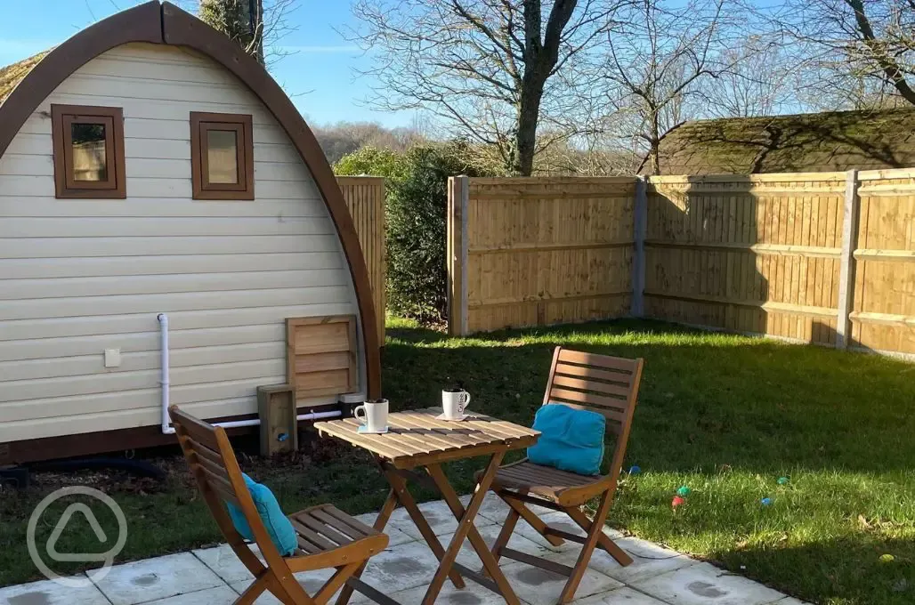 Hobbit glamping pod outdoor seating area