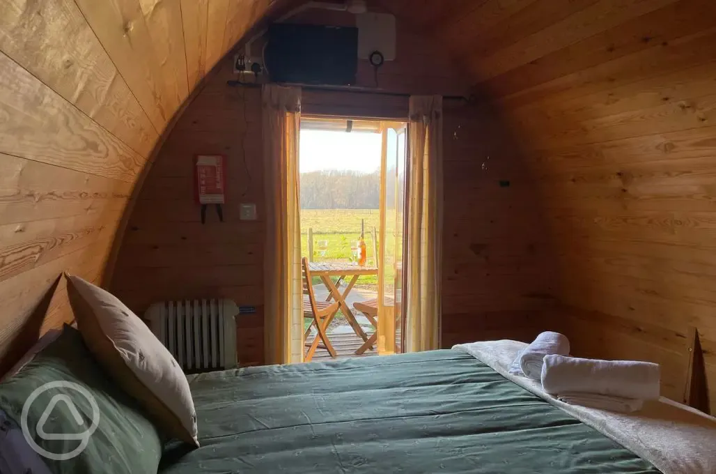 Snuggle Wood glamping pod bed