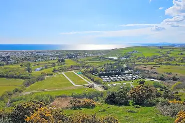 Aerial of Tyddyn Adi Caravan and Camping Park towards Black Rock Sands