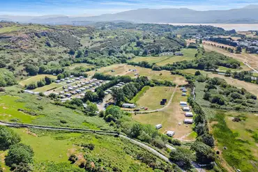 Aerial of Tyddyn Adi Caravan and Camping Park towards Black Rock Sands