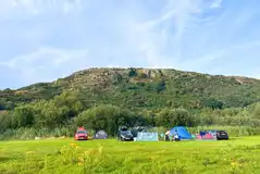 Non electric grass pitches with hillside views