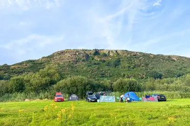 Non electric grass pitches with hillside views