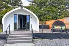 Glamping pod with a deck area and electric hot tub