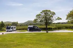 Hardstanding and grass super pitches with countryside views