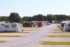 Electric hardstanding pitches (6m x 8m) for caravans, campervans, and motorhomes Electric hardstanding pitches (6m x 8m) for caravans, campervans, and motorhomes