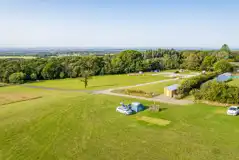 Aerial of the grass tent pitches