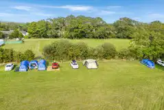 Aerial of the grass pitches in the camping field area