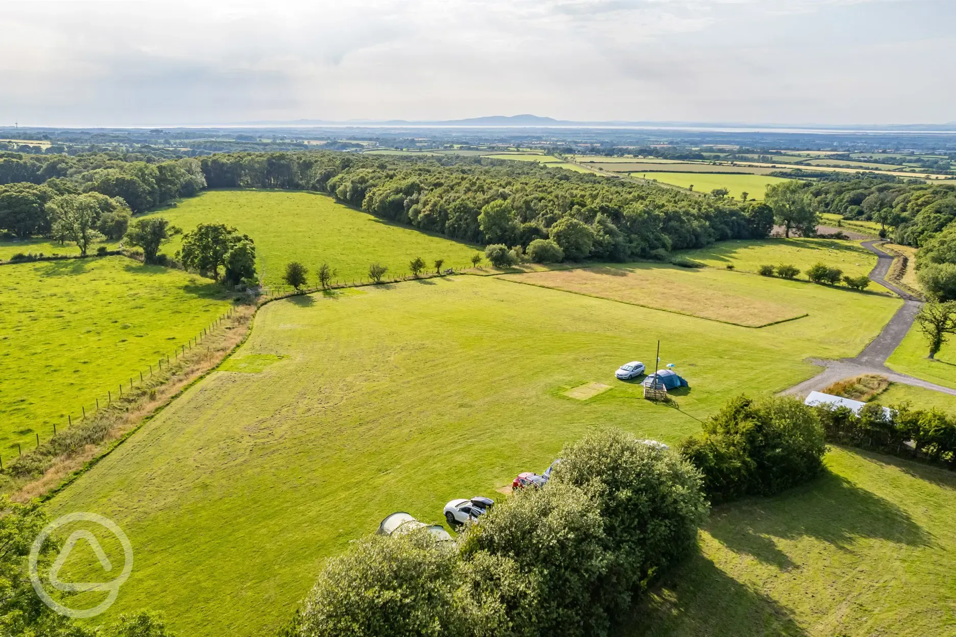 Aerial of the grass tent pitches