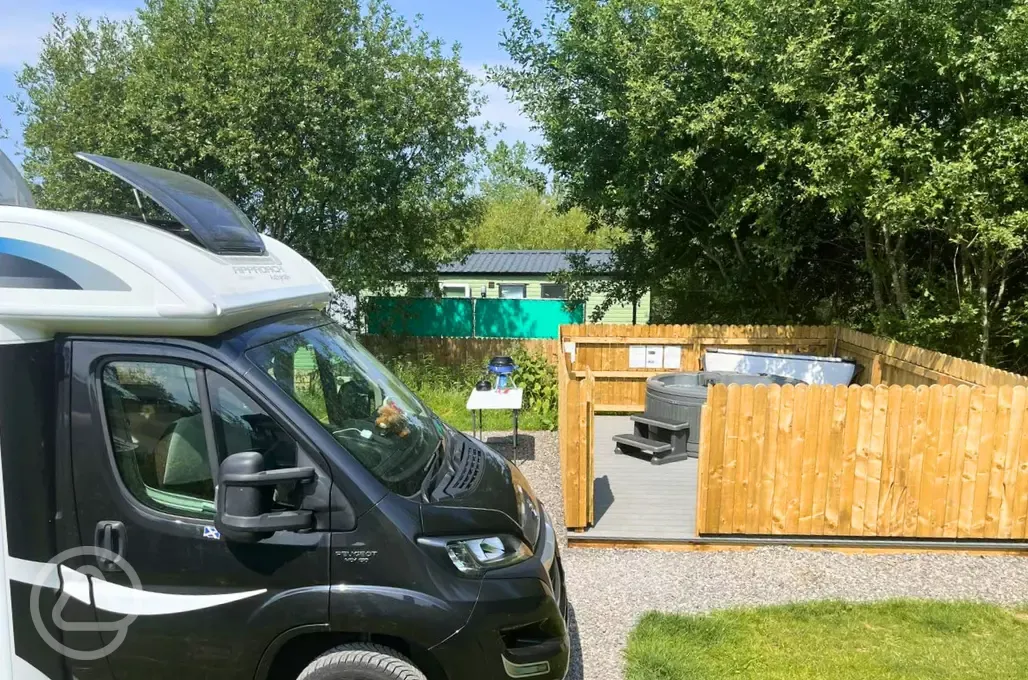 Fully serviced pitches with hot tubs and gated decking areas