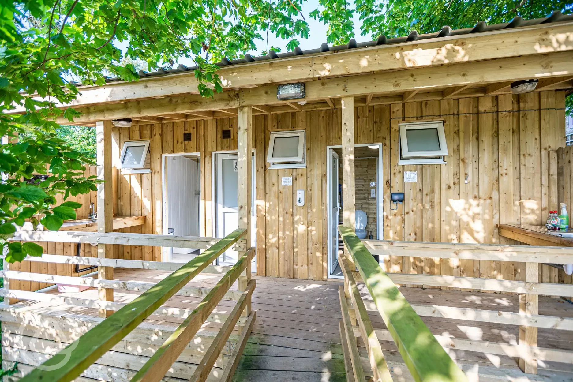 Facilities block with individual bathrooms