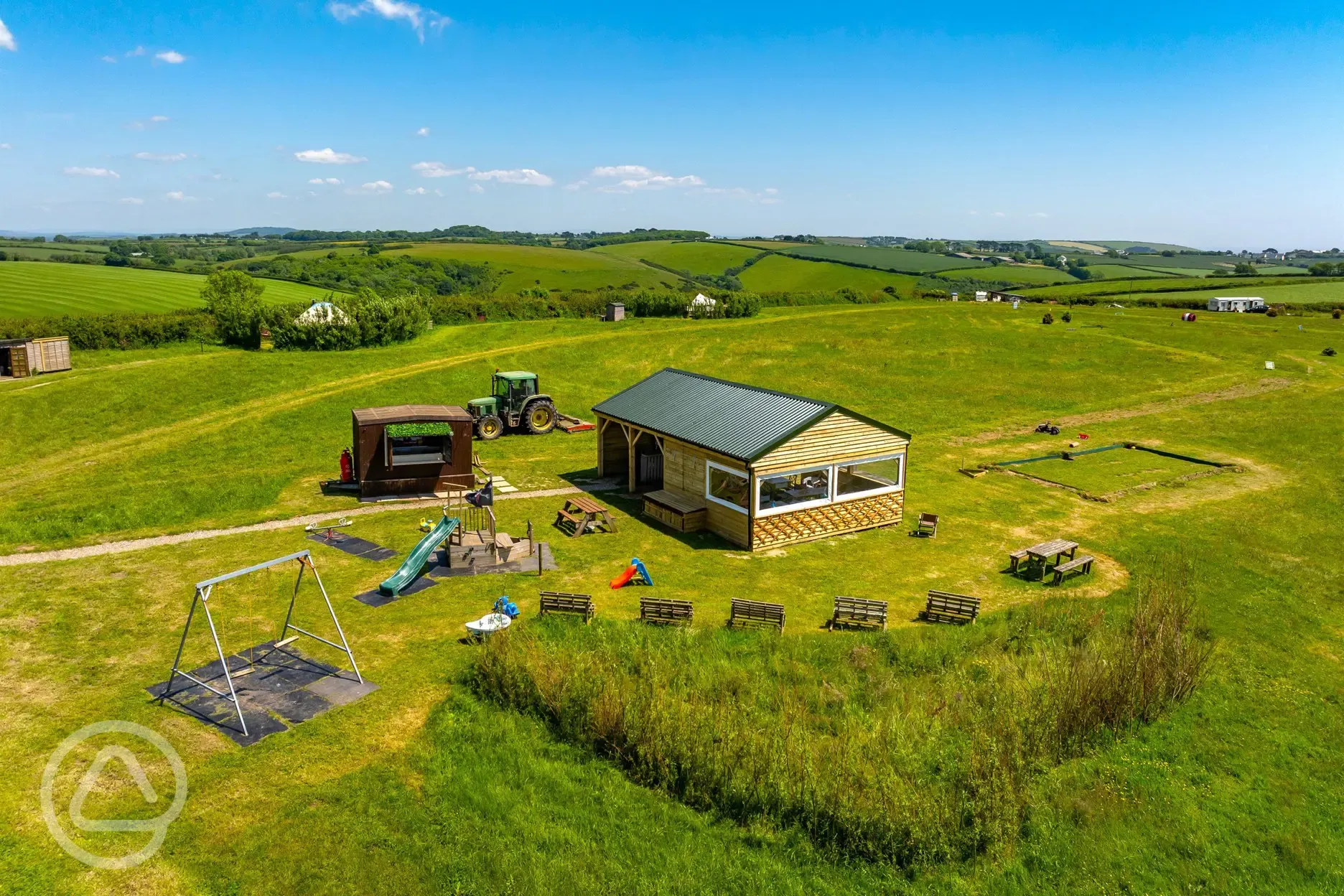 Play area, takeaway hut and communal dining area