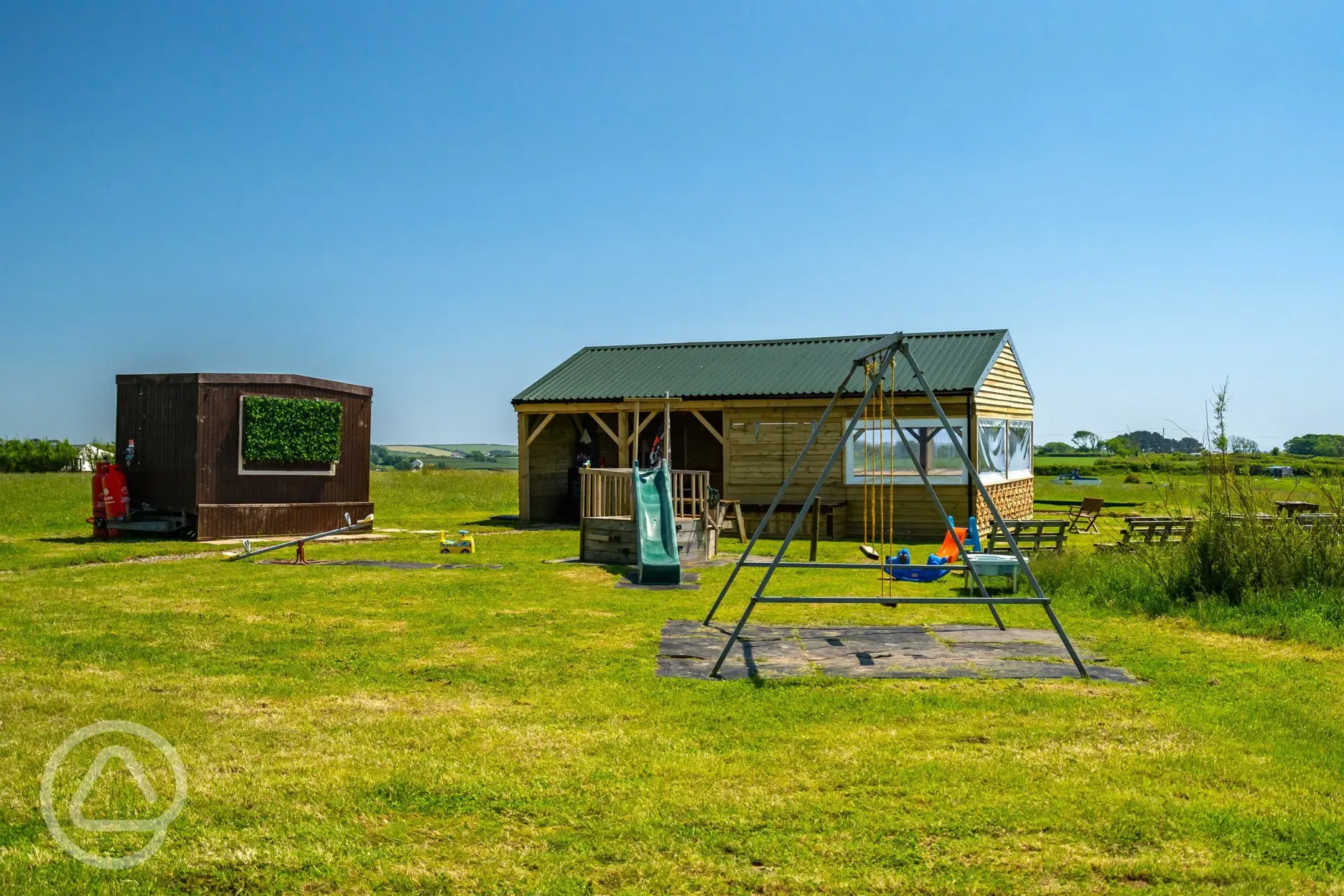 Play area, takeaway hut and communal dining area