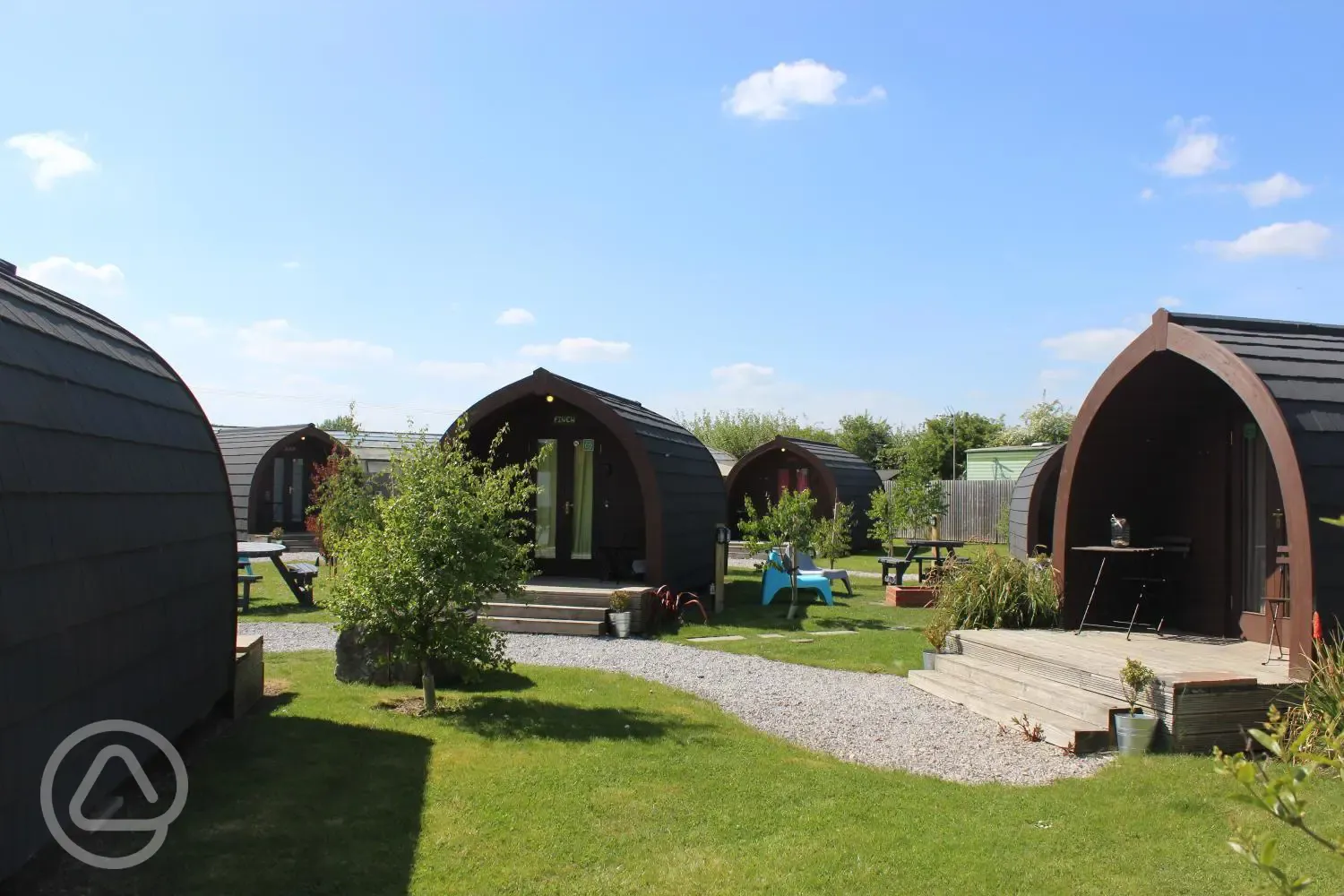 Pods with garden and picnic areas