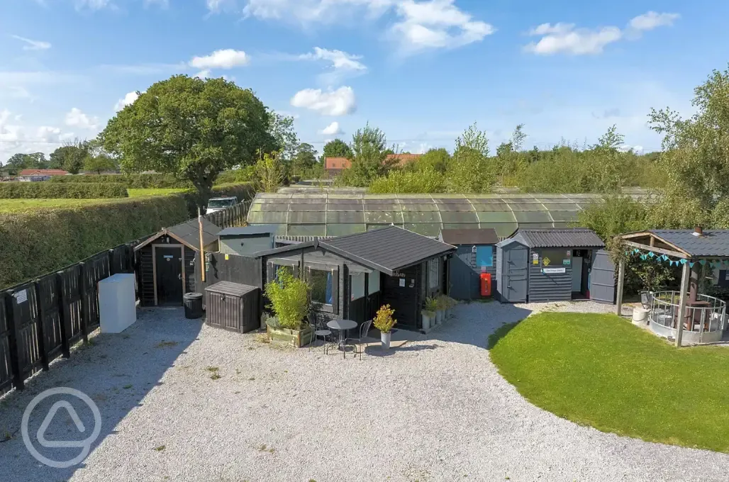 Aerial of the facilities and glamping cabin