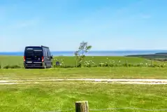 Non electric grass pitches with sea views for tourers