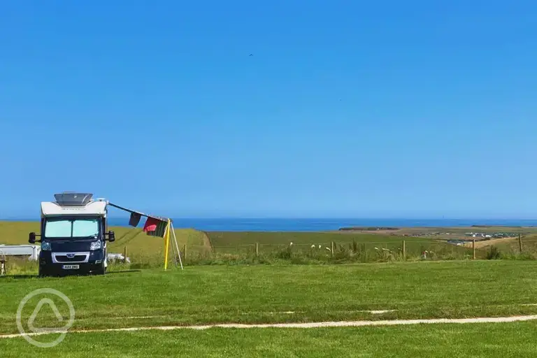 Grass pitches with sea views