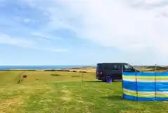 Non electric grass pitches with sea views for tourers
