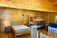 Woodpecker cabin with a double, bunk beds and double sofa bed Woodpecker cabin with a double, bunk beds and double sofa bed