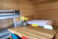 Four-person cabins with a double bed and bunk beds Four-person cabins with a double bed and bunk beds